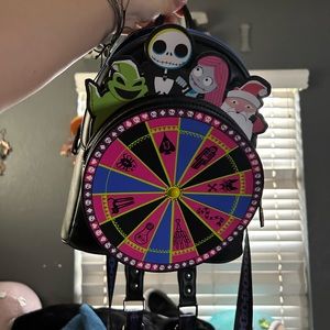 nightmare before Christmas backpack ooogie boogies wheel 🐈‍⬛ LOUNGEFLY‼️